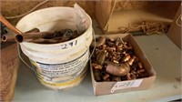 Box and bucket of copper fittings