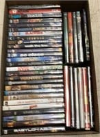 Box of 38 DVDs includes titles such as Iron Man,