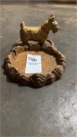 Small wooden coster with dog on it