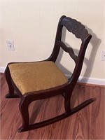 Carved Child’s rocking chair