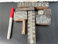 Vintage brass & wood printing blocks.