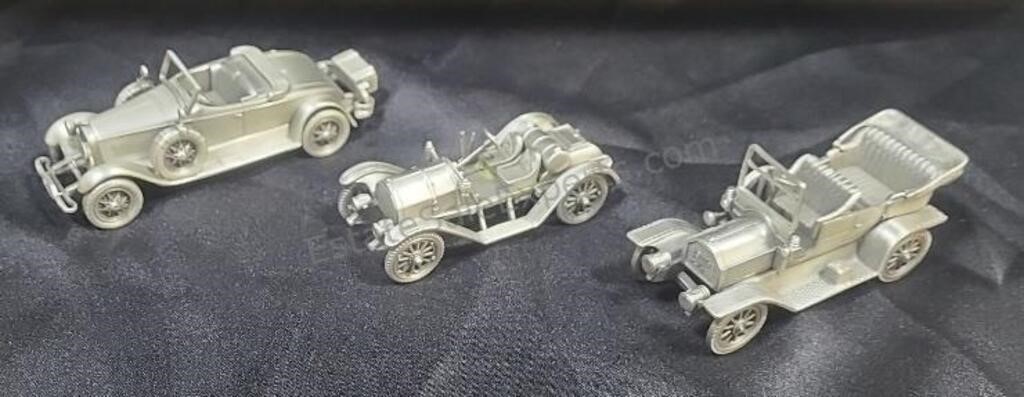 Pewter automobiles from The Danbury Mint.