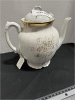 Fire stone pitcher with gold trim