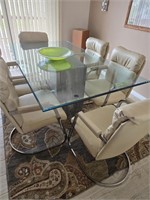 Glass Top Dining Table With Eight Armchairs