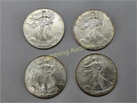 FOUR 2000 AMERICAN SILVER EAGLES