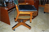 mid century roll around office chair w/green leath