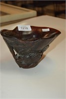 Large carved horn libation cup,