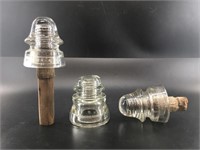 3 Glass insulators, 2 still have the wood, 1 has c