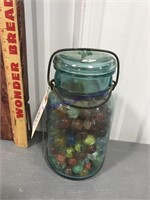 Blue jar of marbles