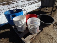 Feed pans and plastic buckets