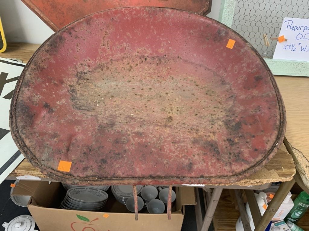 Large Red metal tractor seat