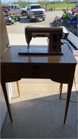 Singer sewing machine and table