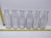 lot of six old milk bottles