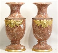 French Pink marble urns with figured gilt bronze