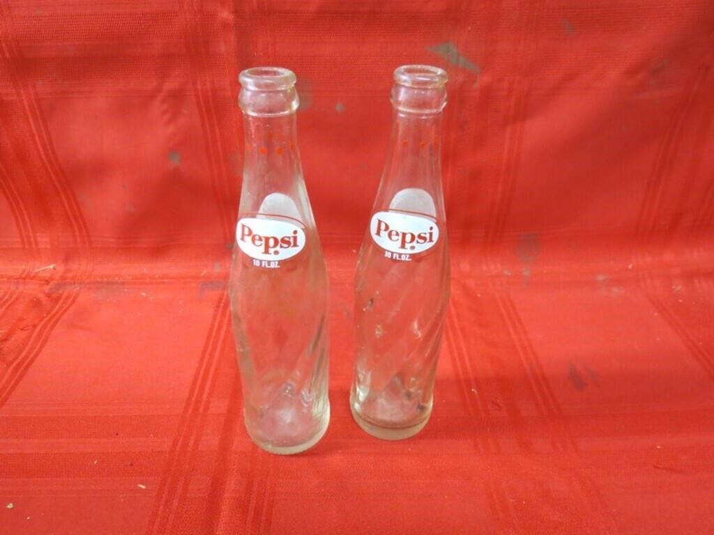 (2)Swirl glass Pepsi bottles.