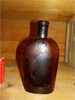 6.25" Brown flask bottle w/ star