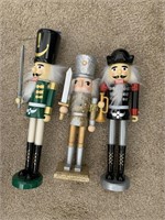 3 SMALL TOY SOLDIERS 1 IS A NUTCRACKER ABOUT 8"