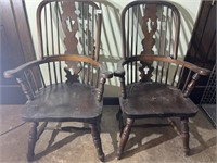 Two windsor chairs with arms