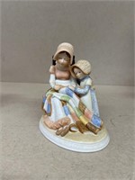 Holly Hobby figure girl sitting with blanket