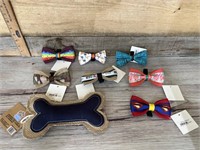 Assortment of dog bowties and toy