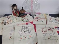 Embroidered dishtowels, glassware & pottery