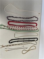 11 assorted necklaces