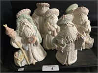 7 Decorative Ceramic Santa Figures.