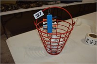 Vintage golf ball basket with tees and used balls