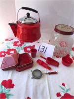 Red metal teapot; glass jar; red box w/ coasters