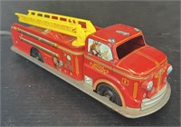 (X) Metal Toy Fire Truck. 14 x 4 1/2 x 4 1/2 in.