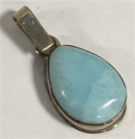 Sterling Silver And Blue Stone Pendant