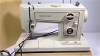 Portable sears Kenmore sewing machine model 148