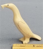 2.75" ivory carving of a bird, with scrimmed and i