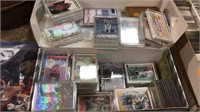 Shoe box filled with sports cards, baseball,