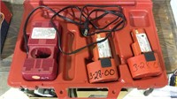 Milwaukee hard plastic case with charger, & two