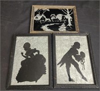 3 silhouette framed photos