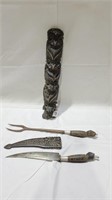 Vintage tribal knife fork and totem