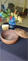 Basket, flowers and a gold colored pot