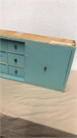 Vintage blue shelf with six drawers