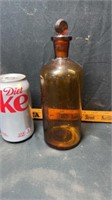Brown medicine bottle w/glass stopper