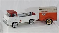 Vintage Ny-Lint toy Ford with Uhaul trailer