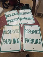Reserve parking signs.