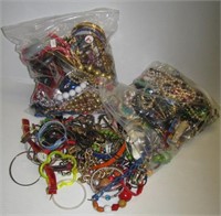(2) Gallon bags filled with misc. costume jewelry.