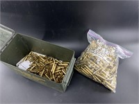 Ammo cannister with over 250 brass casings for .30
