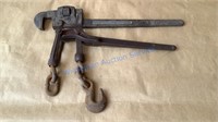 CHAIN BINDER (MISSING HOOK) AND PIPE WRENCH