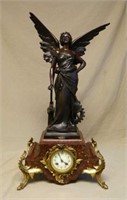 Figural Bronze Clock with Samuel Marti Clockworks.