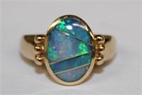 14k yellow gold Opal Ring, opal is inlaid in 4