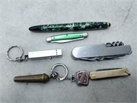 lot of pocket knives, fountain pen and whistle