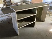 Metal shelving unit with shelf on one end