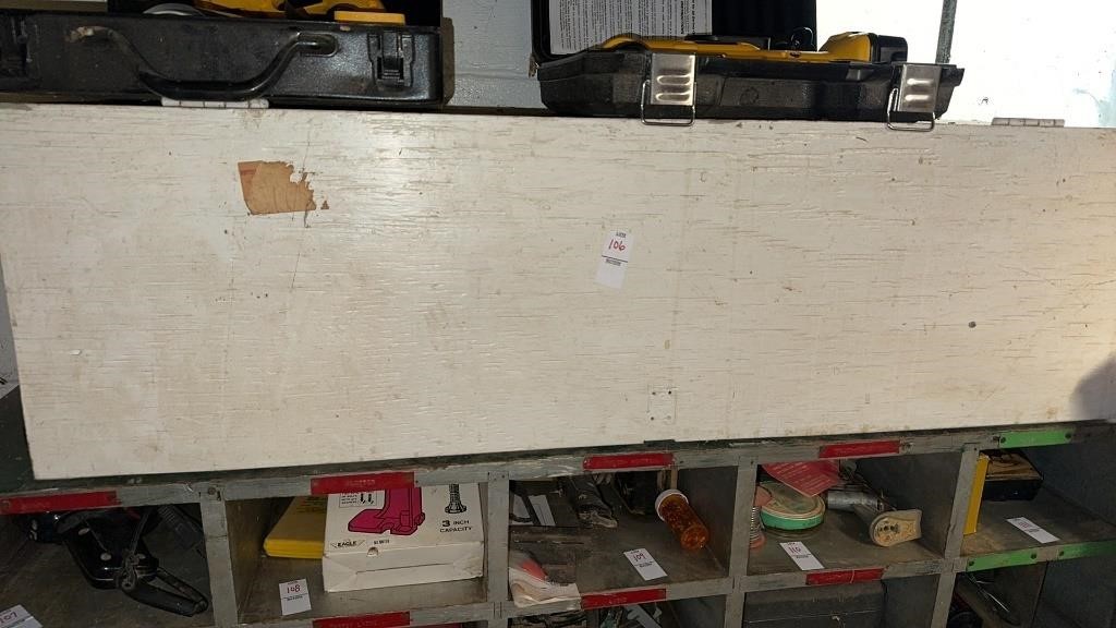 White wood shelf with contents inside
